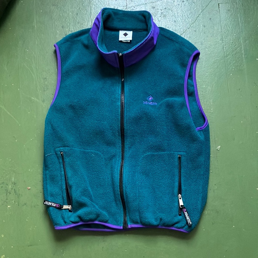 Teal and purple fleece vest. Super comfy and cute, in perfect condition.
